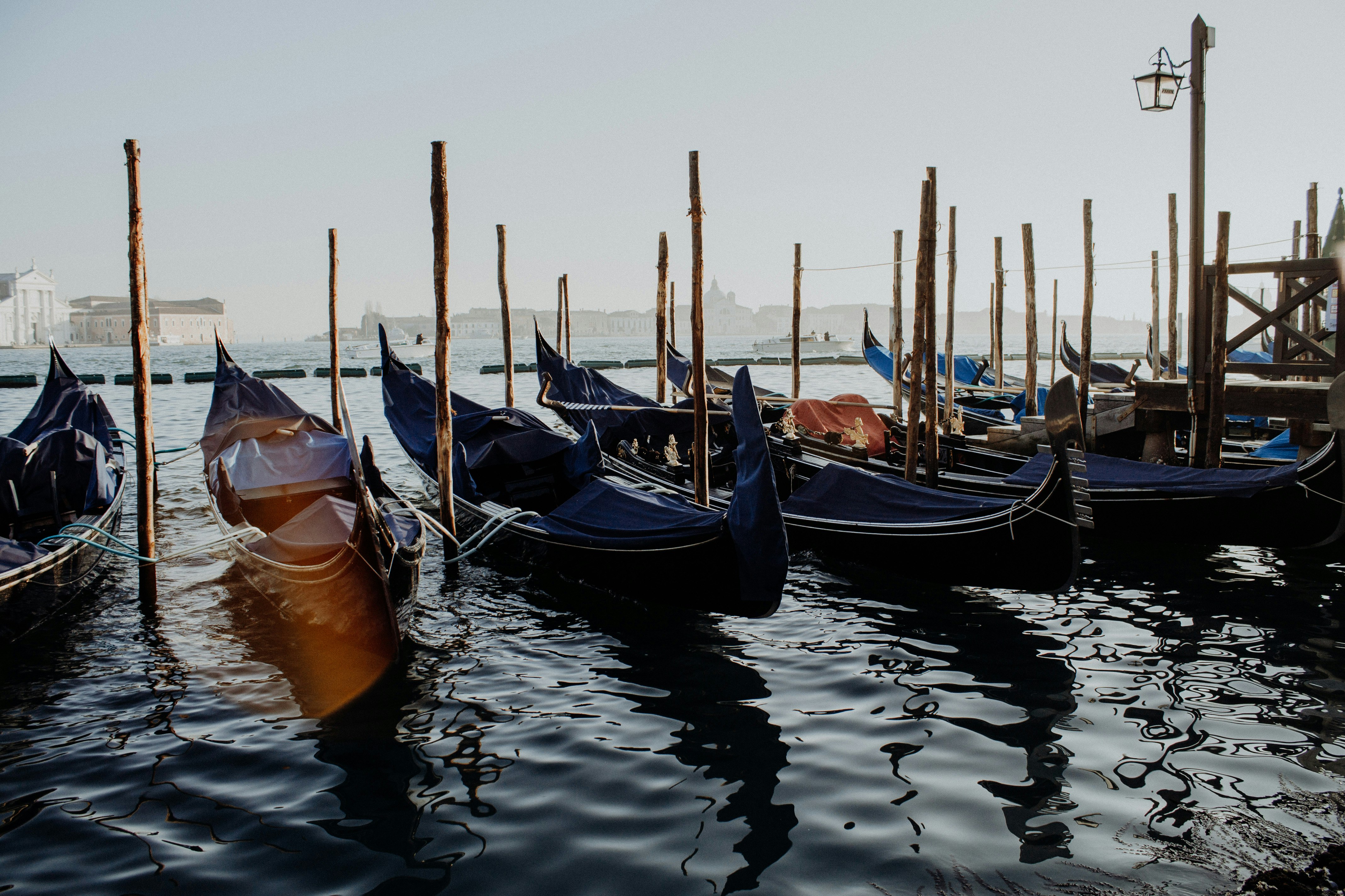 blue and brown boat on water